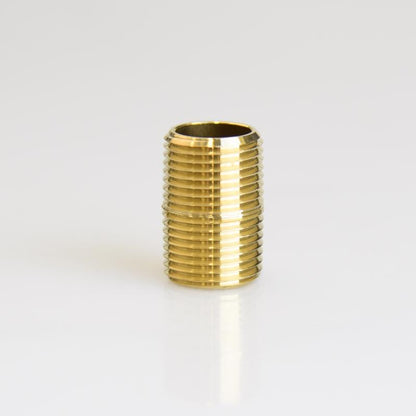 Set of five brass nipples, 3/8 inch NPT close fittings, by Emery Jensen, for plumbing and pipe connections.