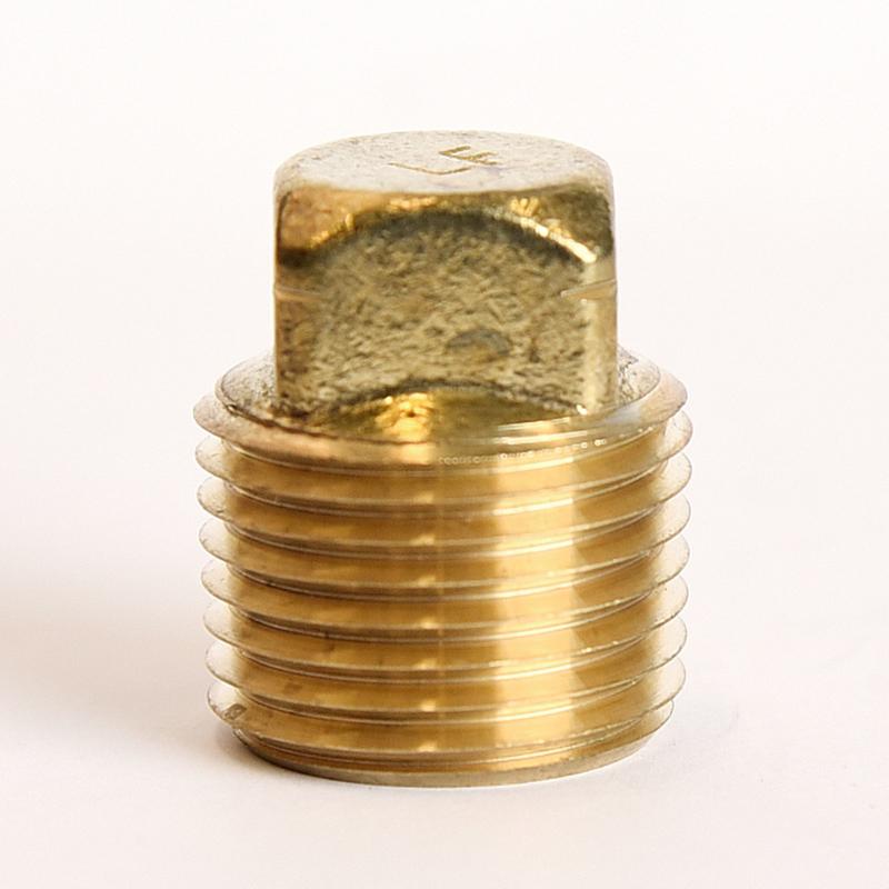 Pack of five Emery Jensen brass CORED 1/2" MPT plugs, bulk brass pipe fittings for plumbing and industrial applications.