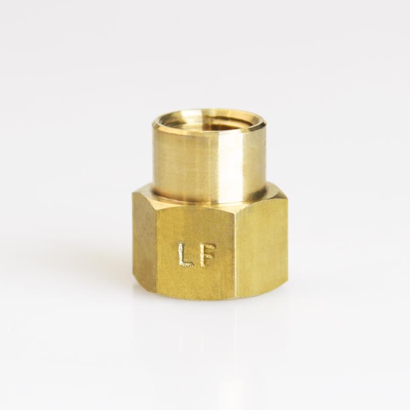 Pack of five brass 3/8-inch by 1/4-inch FPT pipe fittings, bulk Emery Jensen brass plumbing couplings on white background.