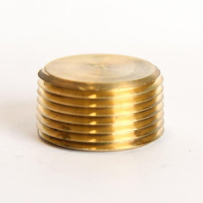 Set of five brass threaded sink plugs with 3/4-inch MPT fittings from Emery Jensen, showing the threaded brass insert design.