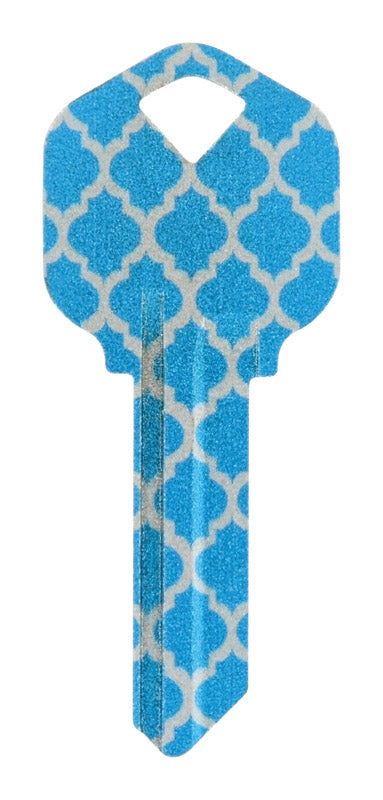 Six painted Moroccan-style cylinder sports T-shaped metal objects from Emery Jensen, arranged in a pack for versatile use.