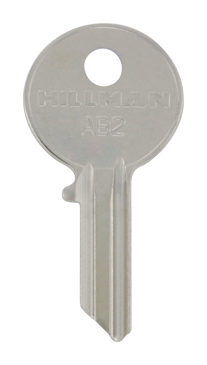Pack of four KEYKRAFTER #215 brass keys by Emery Jensen, showing the detailed key blades and key heads.