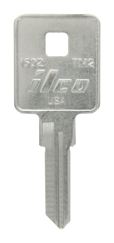 Pack of four KEYKRAFTER #177 brass keys by Emery Jensen, showing close-up of shiny brass key blades and key heads.
