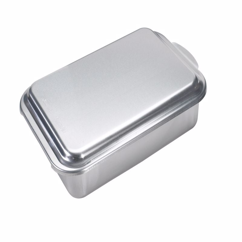 Two aluminum bakeware pans from Emery Jensen's 2-piece bake pan set, featuring non-stick surfaces and durable aluminum construction.