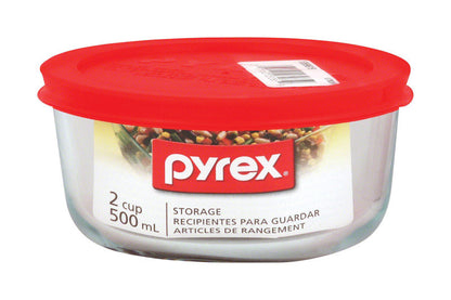 Set of six Emery Jensen Pyrex round food storage containers with red lids, perfect for keeping leftovers fresh.