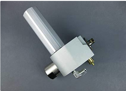 Titan Powrliner 2850 fluid section assembly, packaged, showing detailed view of the hydraulic fluid section for power tools.