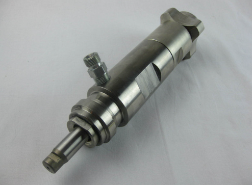 Titan Fluid Section 1040 sprayer accessory, packaged, showing detailed view of the component and connection points.