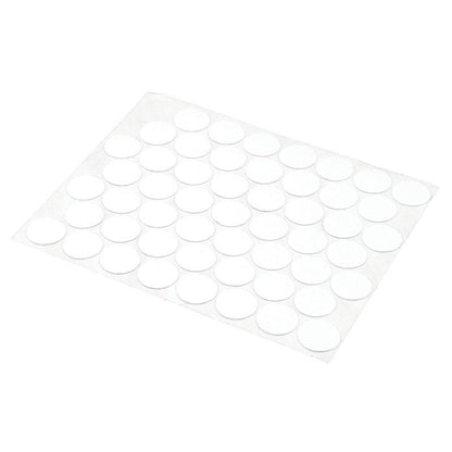 White screw hole cover from Emery Jensen all dowels set, used to conceal screw holes for a clean finish on furniture or walls.