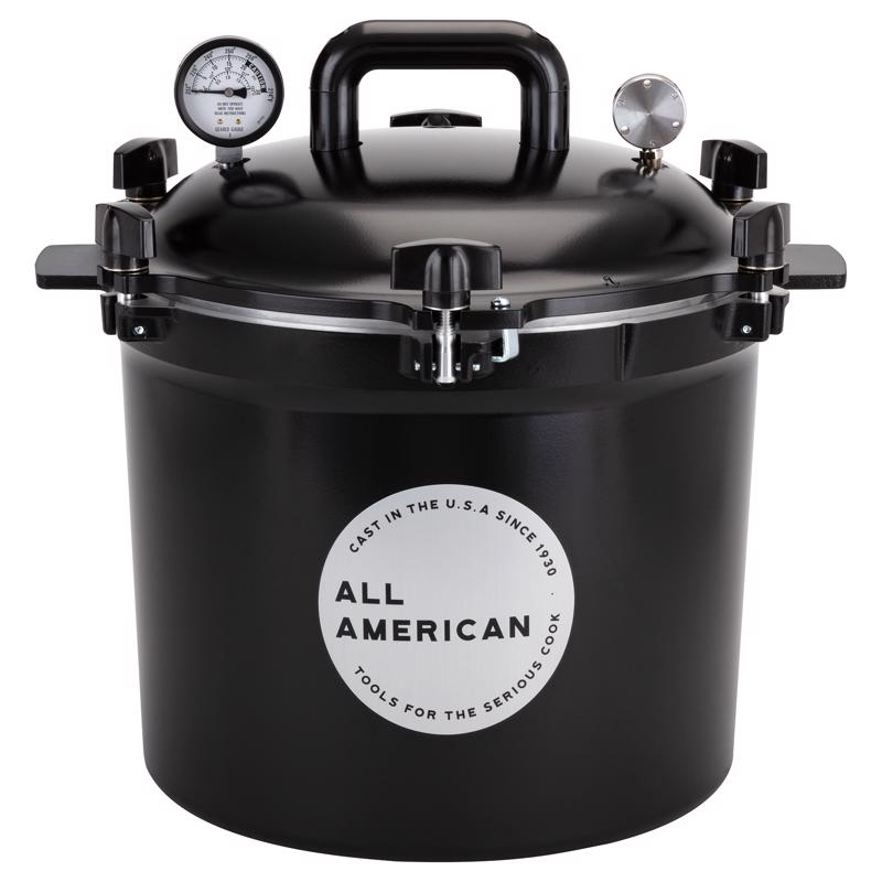 Black 12-inch Emery Jensen All Pressure Cooker for versatile cooking, with sturdy handles and secure lid locking.