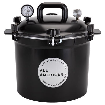 Black 12-inch Emery Jensen All Pressure Cooker for versatile cooking, with sturdy handles and secure lid locking.