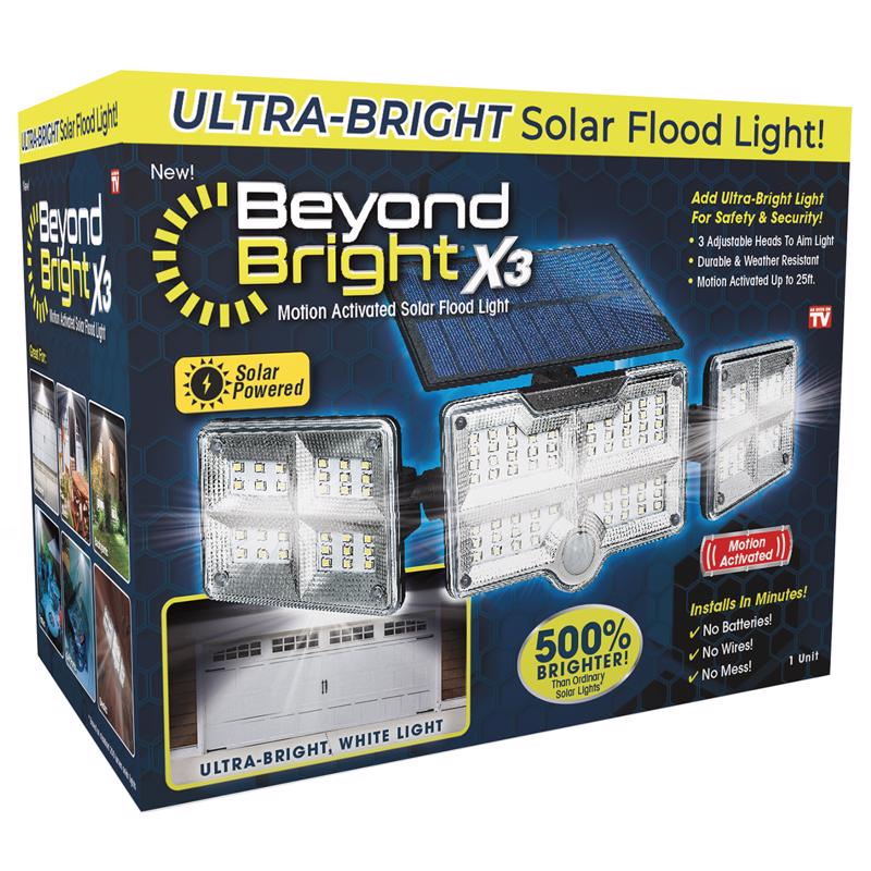 Black Floodlight 1000L by Emery Jensen, as seen on TV, shown illuminating a dark outdoor area.