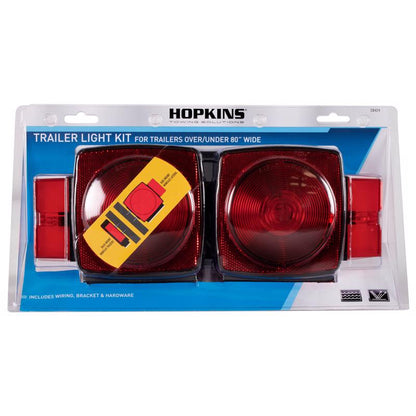 Red trailer backup and clearance light kit from Emery Jensen, 5.25 inches, for enhanced vehicle visibility and safety.