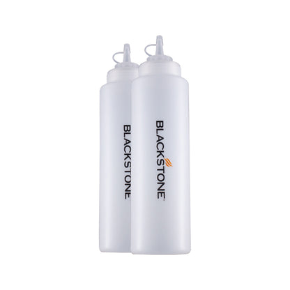 Emery Jensen 32oz BBQ basting bottles, 2-pack, used for applying sauces and marinades during grilling and cooking.