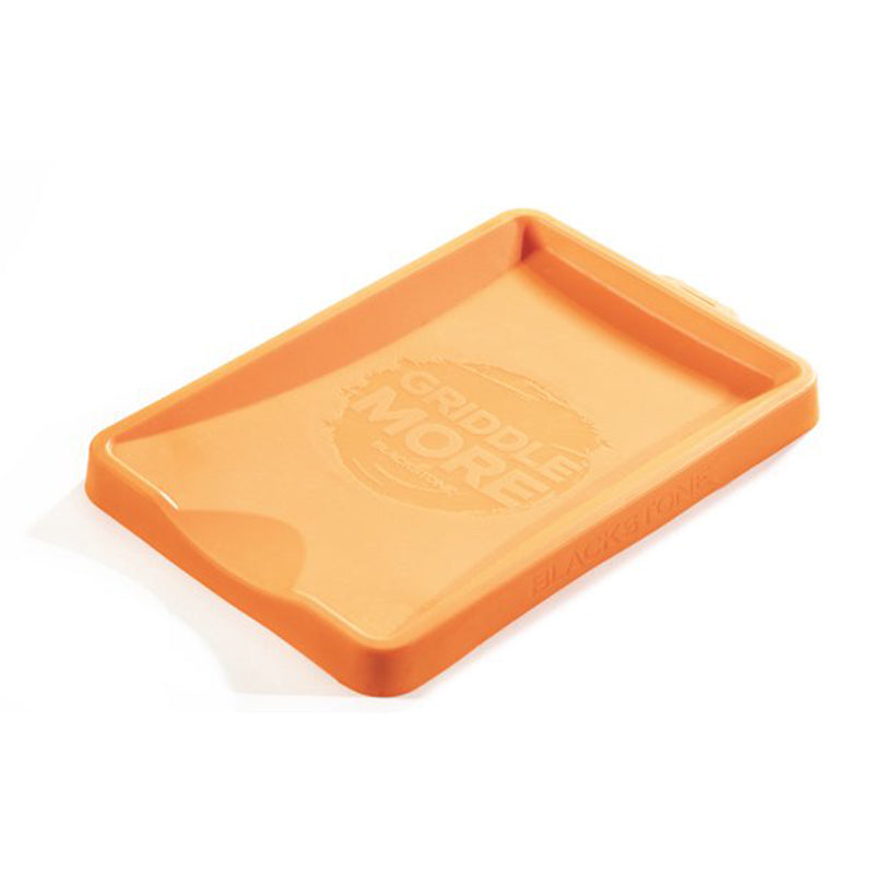 Emery Jensen BLKSTNE BBQ cooking accessories with a silicone spatula and slcone mat for grilling and food preparation.