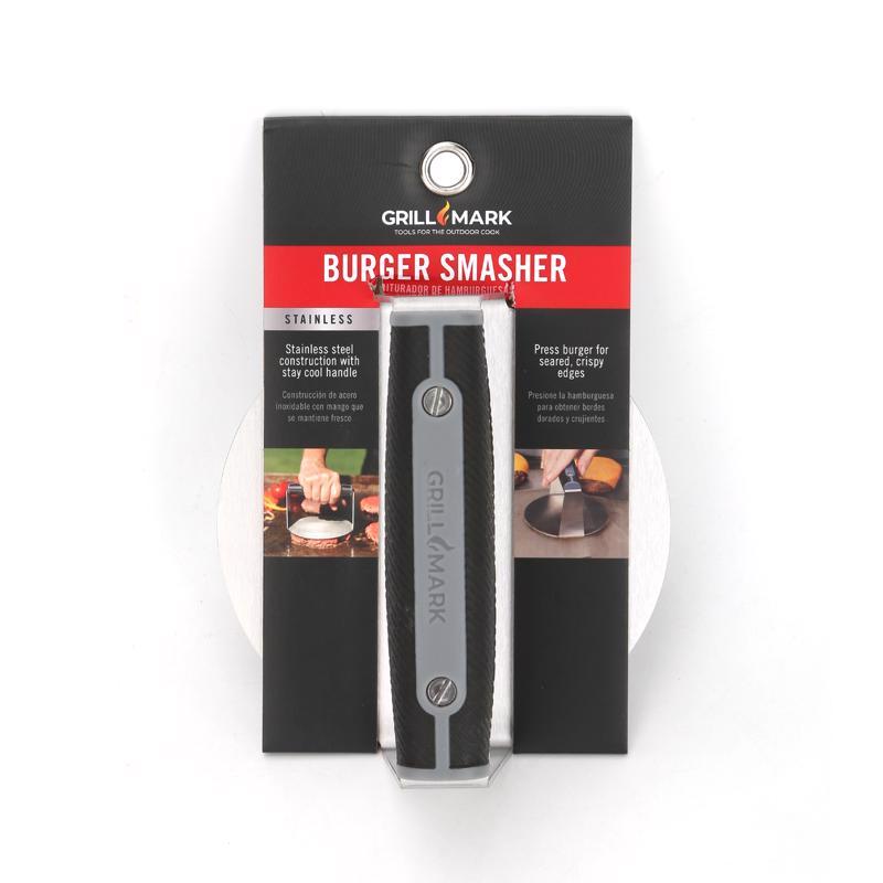 Emery Jensen stainless steel burger press for BBQ cooking accessories, showing a sturdy round press with textured handle.