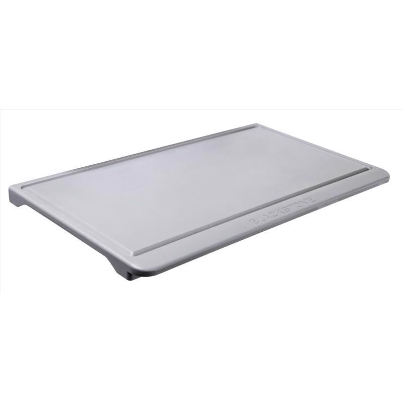 Emery Jensen BBQ cooking accessories cutting board made of polypropylene, rectangular, with a smooth surface for food preparation.