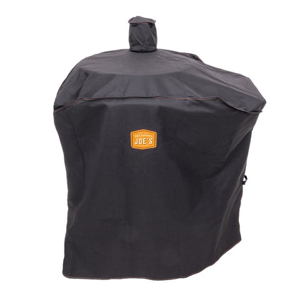 Black smoker cover for BBQ grill, 45x34 inches, by Emery Jensen, protects smoker from weather and dust.