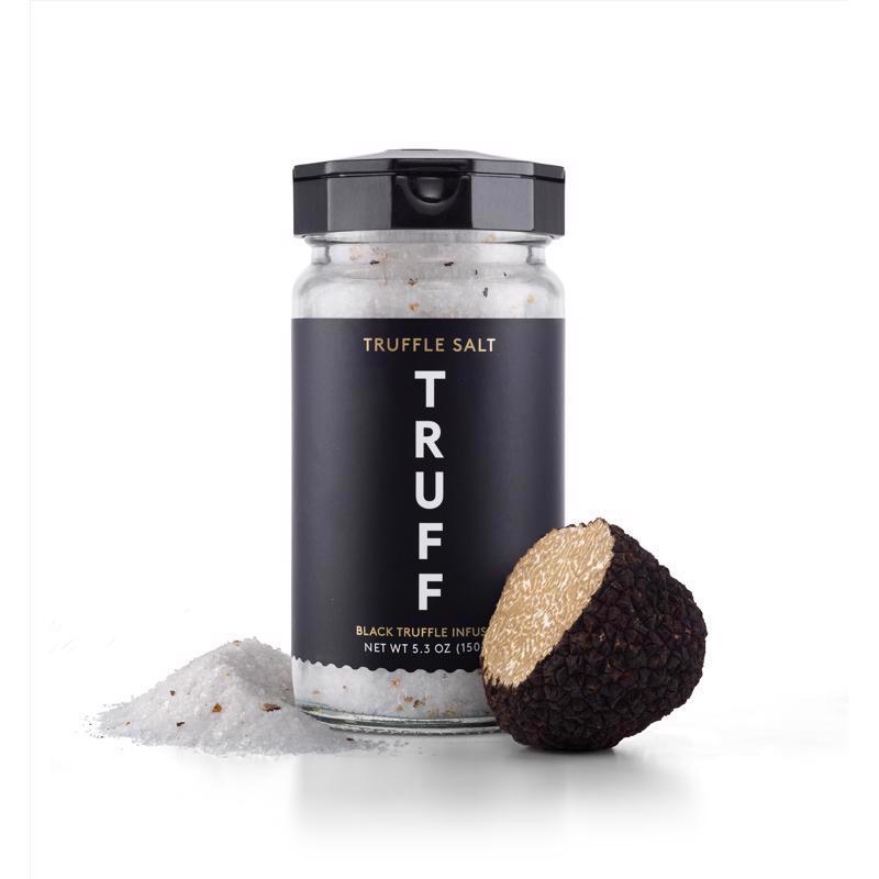 Emery Jensen black truffle salt seasoning in a 5.3oz jar, ideal for enhancing grilled meats and gourmet dishes with truffle flavor.