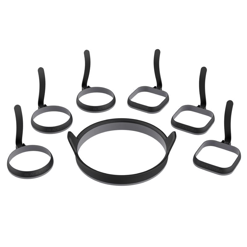 Emery Jensen stainless steel BBQ tool set with seven egg rings for grilling and breakfast cooking.