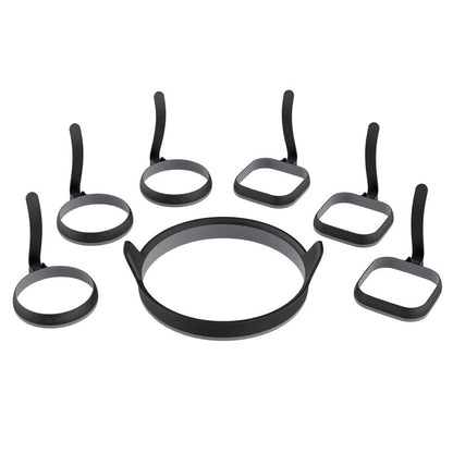 Emery Jensen stainless steel BBQ tool set with seven egg rings for grilling and breakfast cooking.