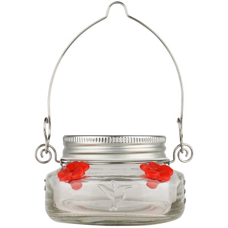 Emery Jensen 6oz bird feeder jar showing clear glass container with metal lid and perch for feeding small birds outdoors.
