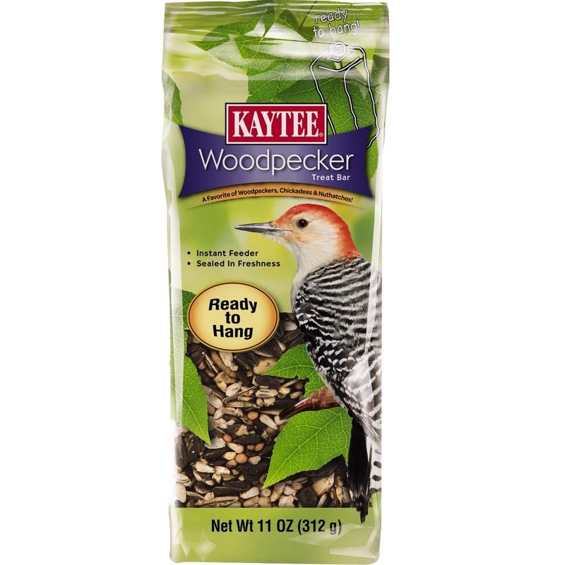 Emery Jensen bird seed WDPECKER Bar11O in a clear container, showing the colorful bird seed mixture inside.