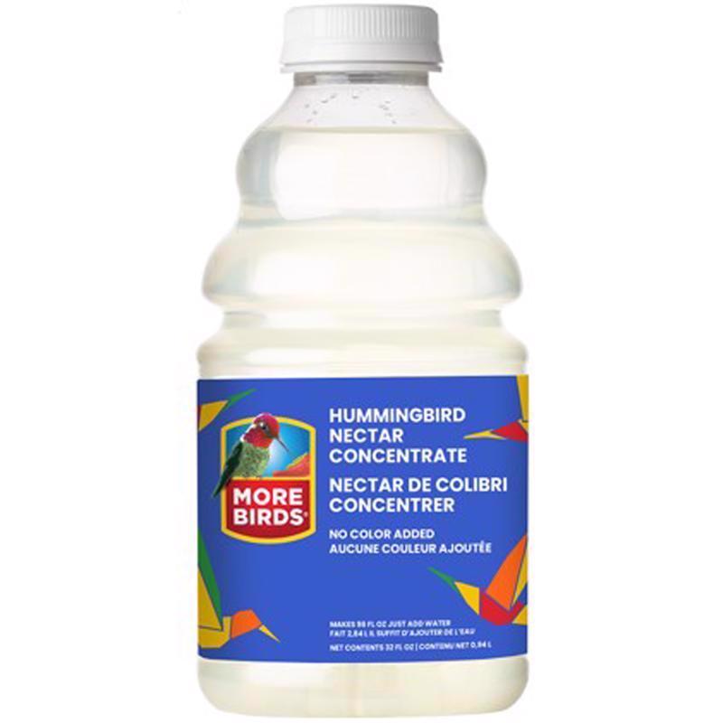 Emery Jensen NECTR bird seed in a 32oz clear container, showing colorful bird seed mixture inside.