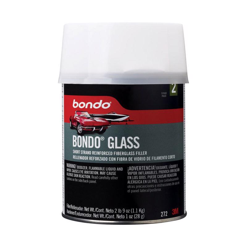 Emery Jensen Filler Bondo Fibrglas QT body filler in a container for automotive repairs and surface smoothing.