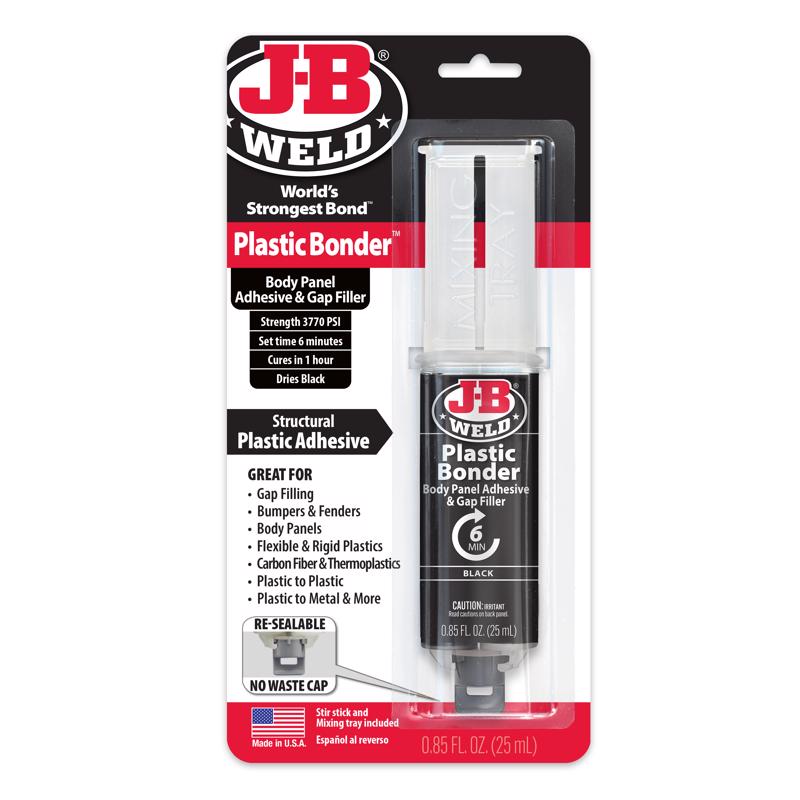 JB Weld Auto Adhesive in .85oz body repair kit by Emery Jensen, shown in a close-up of the adhesive tube and repair tools
