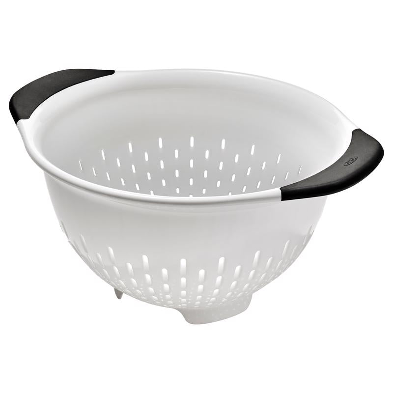 White 3-quart plastic colander by Emery Jensen, with large drainage holes and sturdy handle for rinsing and draining foods.