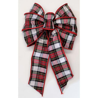 Emery Jensen holiday bows and ribbons in black, red, and white, perfect for Christmas gift wrapping and decorations.