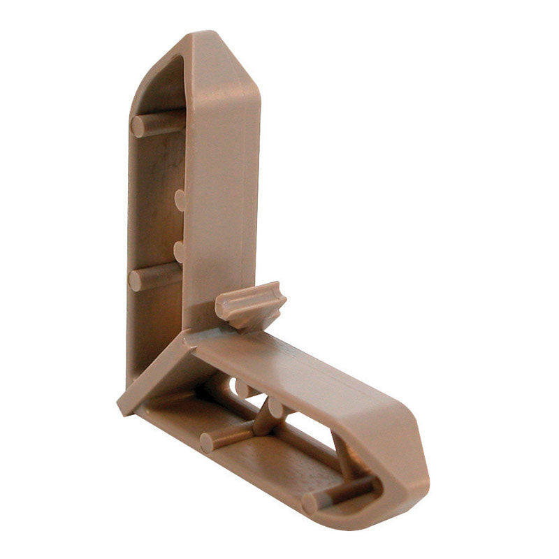 Emery Jensen bulk backroom corner trim in 3/4 inch tan Pella, shown in a storage setting with product packaging visible.