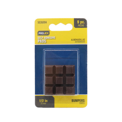 Set of nine Emery Jensen 1/2-inch square bumper rubbers for furniture or cabinetry protection.