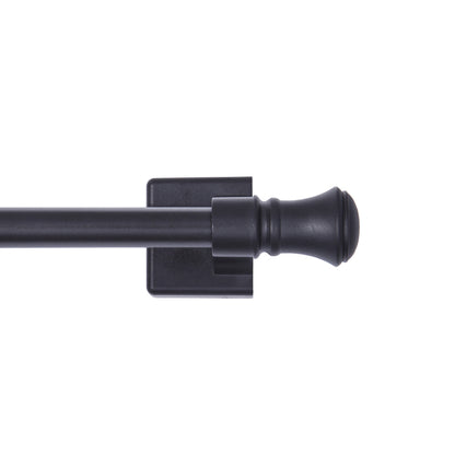 Black 28-inch Emery Jensen Cafe Rod magnet curtain rod mounted on a window frame for kitchen or cafe curtains.