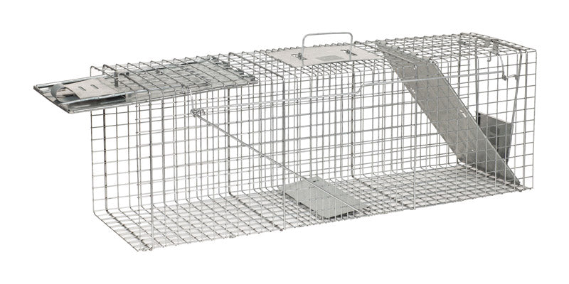 Emery Jensen Havahart cage trap, 36-inch metal trap for humane capture of small animals, with spring-loaded door and durable wire construction.