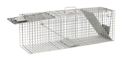 Emery Jensen Havahart cage trap, 36-inch metal trap for humane capture of small animals, with spring-loaded door and durable wire construction.