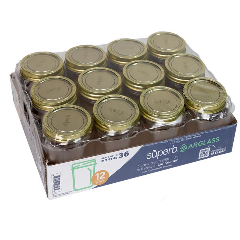 Emery Jensen Canning Jars with metal lids, clear glass containers for preserving and storing food.