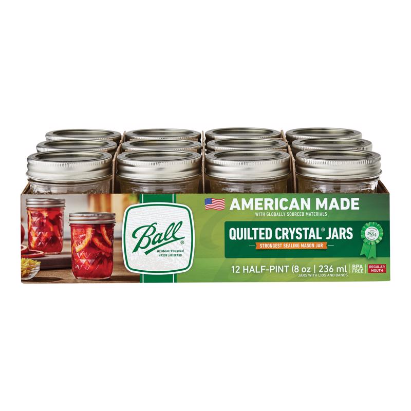 Set of twelve Emery Jensen 8oz jelly jars, clear glass canning jars for preserves and jams, with metal lids and rings.