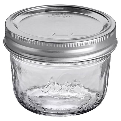 Set of 12 Emery Jensen 1/2 pint Mason canning jars, clear glass storage jars for preserves and homemade goods.