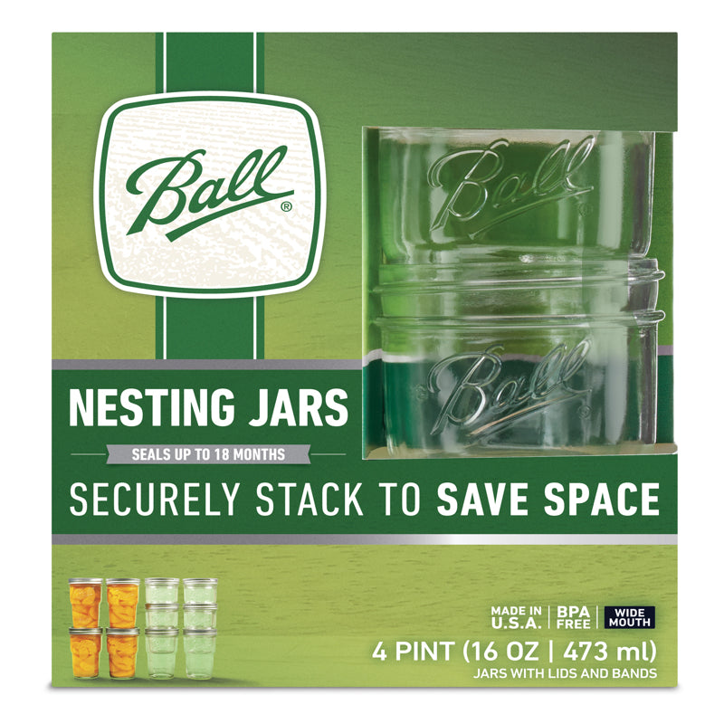 Emery Jensen 16oz glass nesting canning jar with metal lid, ideal for preserving and storing food in the kitchen.