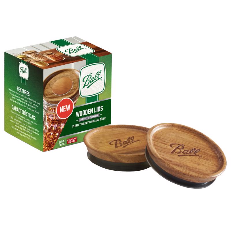 Emery Jensen canning jar lid with a wood textured surface and regular mouth opening, designed for sealing jars.