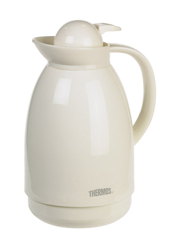 Emery Jensen 34oz thermal carafe with stainless steel lid and body, designed for hot and cold beverages.