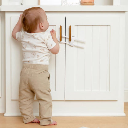 Emery Jensen child safety cabinet locks in white, set of two, designed to secure cabinets and prevent access by children.