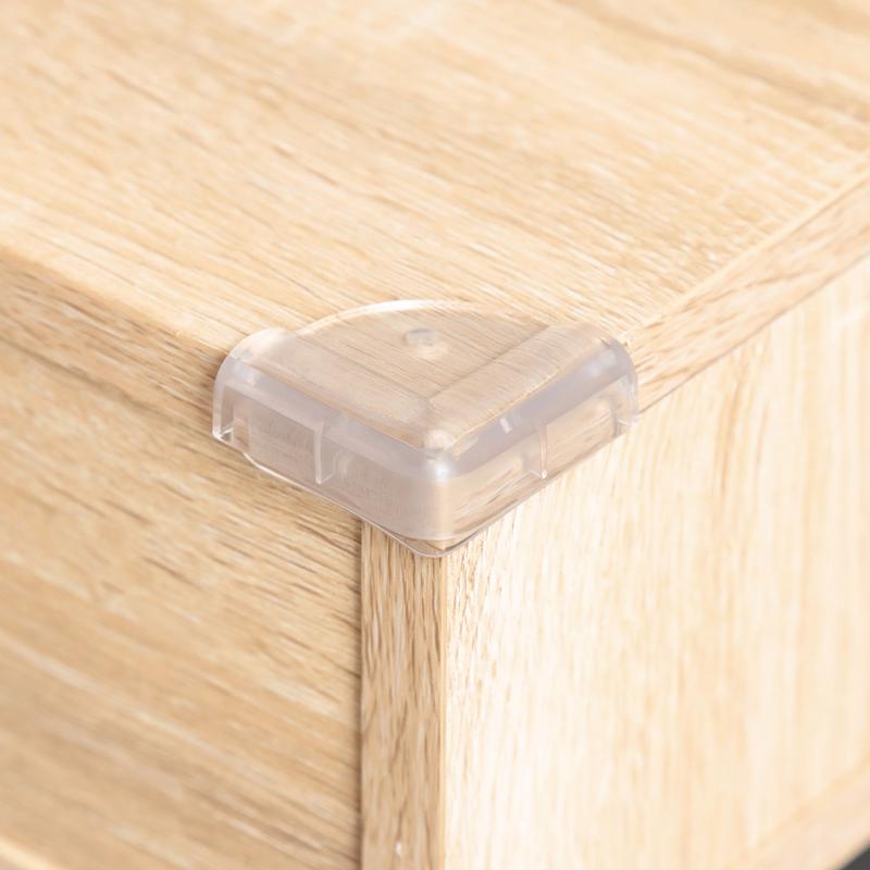 Emery Jensen child safety corner cushions in a vibrant rubr clr, designed to protect children from sharp table edges.