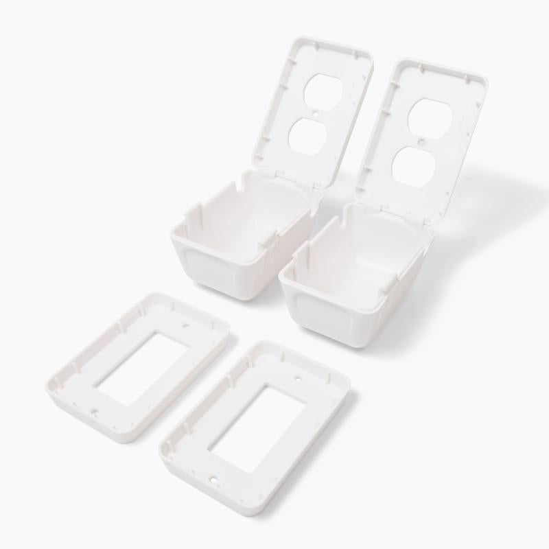 Emery Jensen child safety outlet cover plates in white, set of two, designed to cover electrical outlets for child protection.