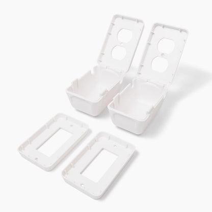 Emery Jensen child safety outlet cover plates in white, set of two, designed to cover electrical outlets for child protection.
