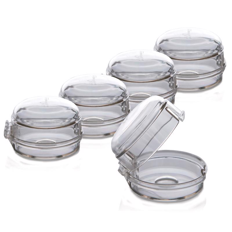 Set of five clear Emery Jensen stove knob covers for child safety, designed to prevent accidental knob operation.