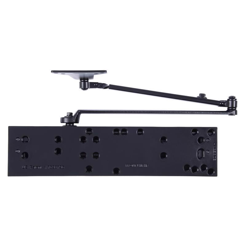 Black Emery Jensen ADJUSTBL door closer mounted on a door, showcasing its sleek design and adjustable mechanism.