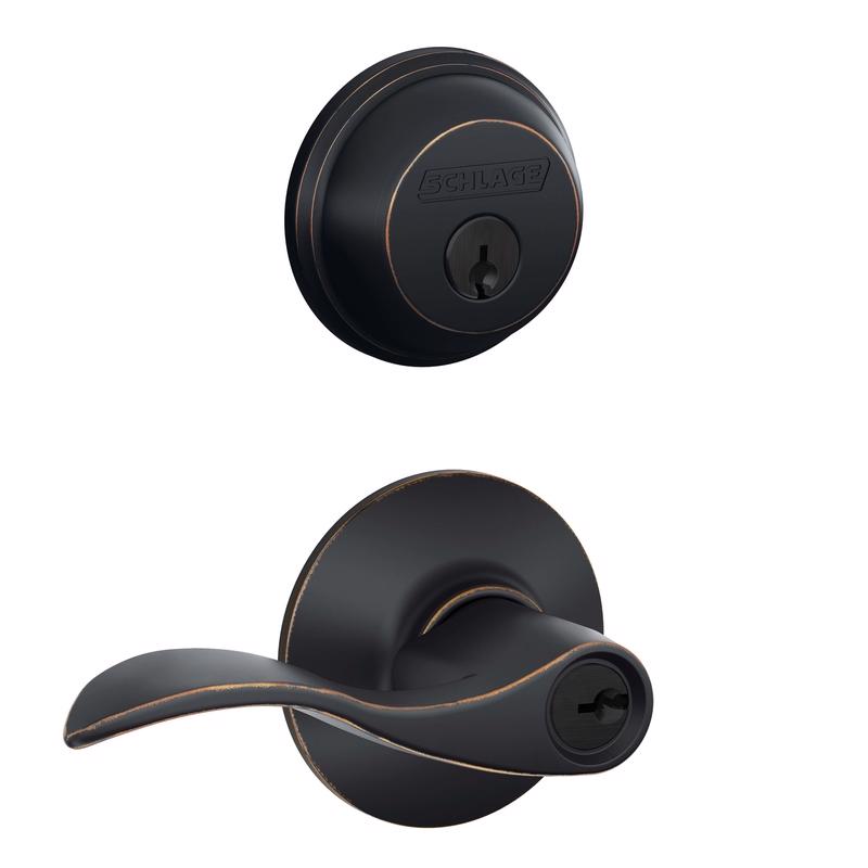 Aged bronze deadbolt and lever door lock combination pack by Emery Jensen, featuring a secure deadbolt and stylish lever handle.