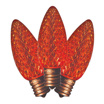 Emery Jensen LED C9 SMD bulb in orange for commercial lighting, shown in a close-up view of the bulb filament and base.